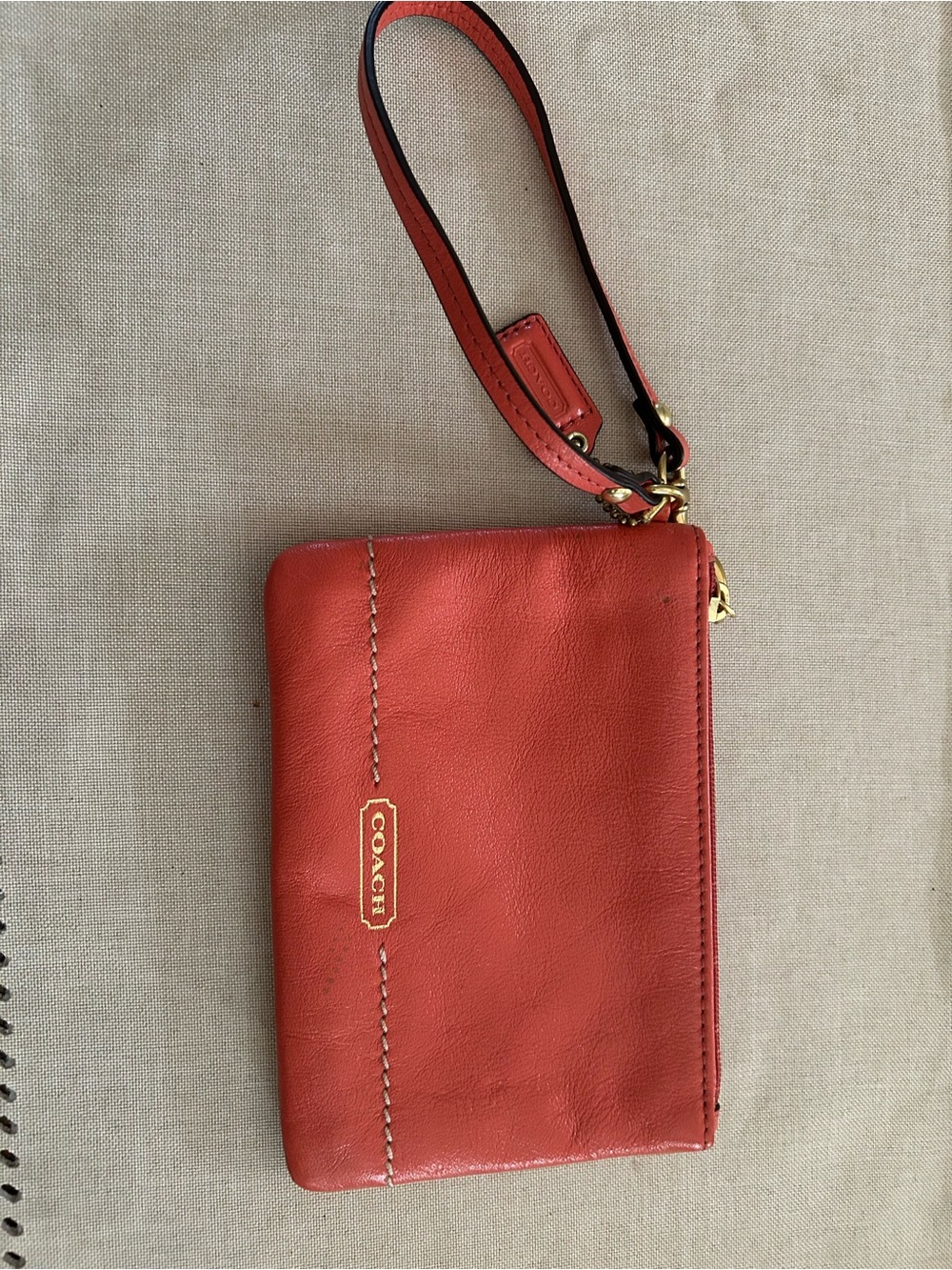 Coach Coral Leather Wristlet with Gold-Tone Logo